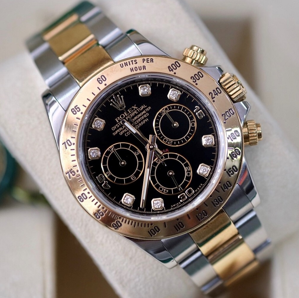 Đồng hồ Rolex Daytona 116523 Mặt đen Cọc kim Demi vàng 18k