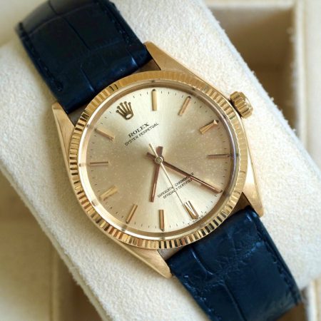 Đồng hồ Rolex 1005 Vàng 18k Mặt tia cọc số vàng